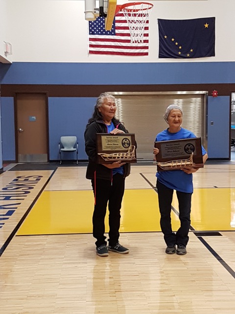  Anecia Johnson and Elena Johnson hold their awards for 25 years of service to SWRS.