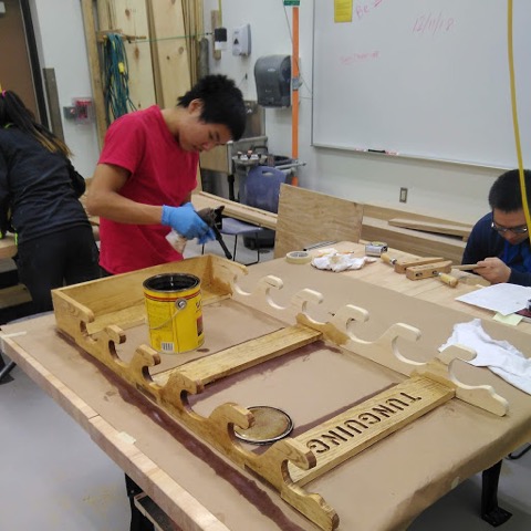  A student works on a project in the wood shop.